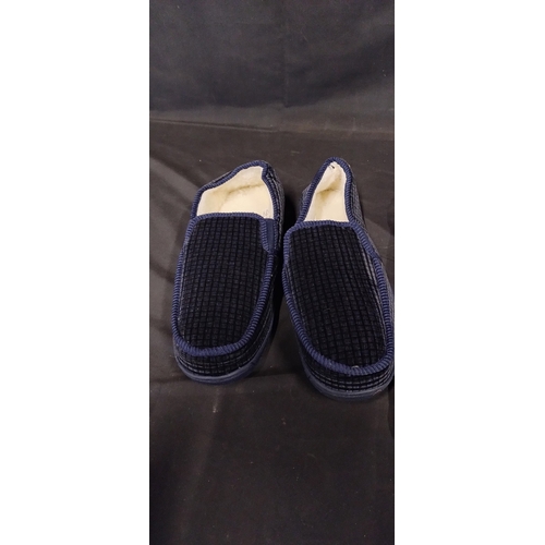 110 - Pair of mens slippers size Uk 10 and a white short sleeved thermal vest size large