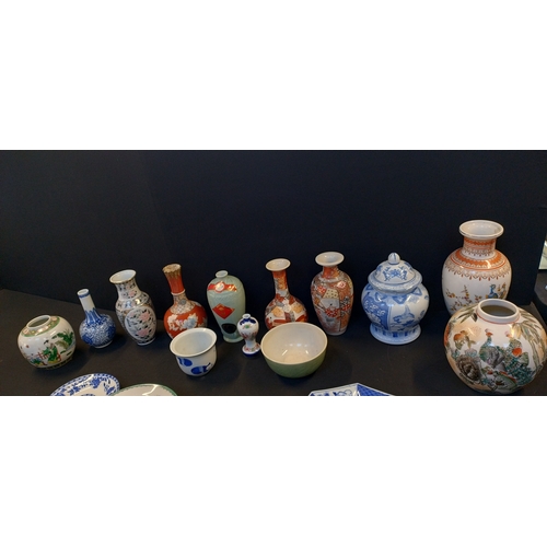 119 - Collection of Chinese style pottery including ginger jar, plates and vases