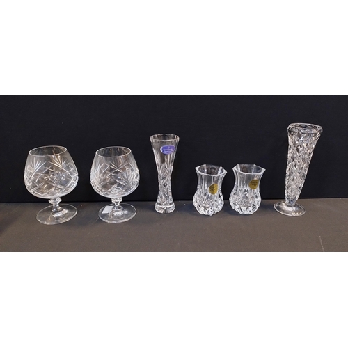 130 - Collection of glassware, champagne flutes, wine glasses, small vases, brandy glasses.