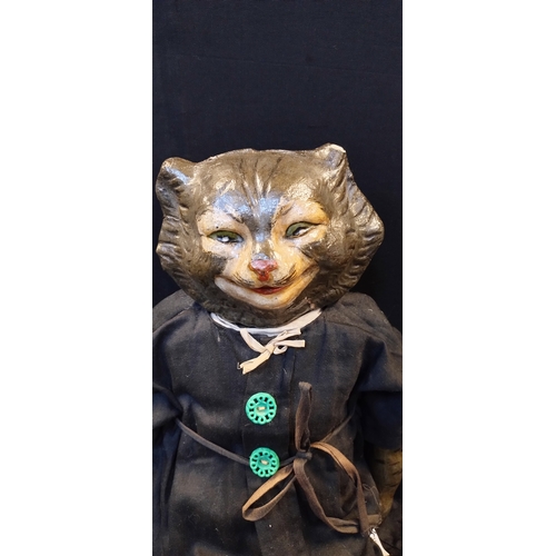 134 - 1920's handmade straw filled cat in dressed as pussin boots. Measures approx H 55.5 cm