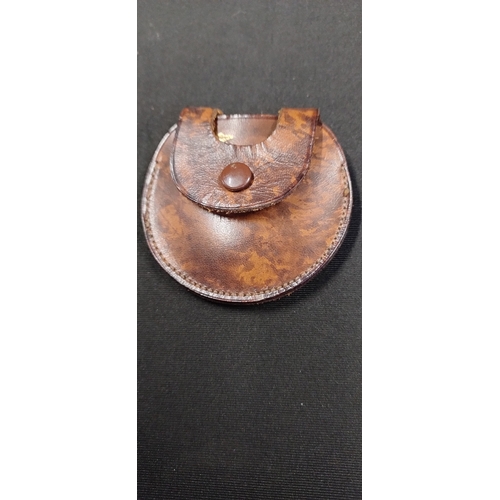 2 - Antique monacle in a leather pouch