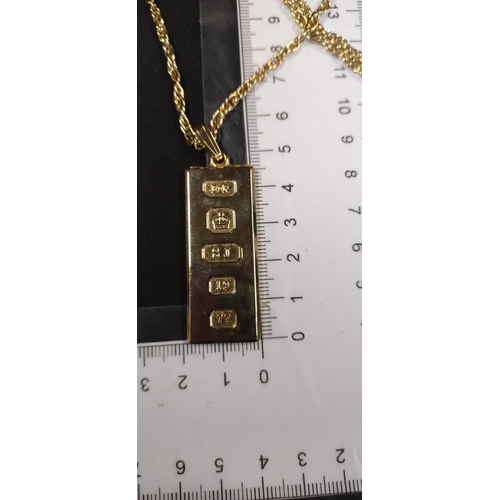 6 - 22ct gold plated ingot on chain. Chain measures approx L 22 inch,