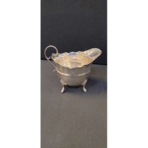 14 - Sterling silver cream jug dated 1925