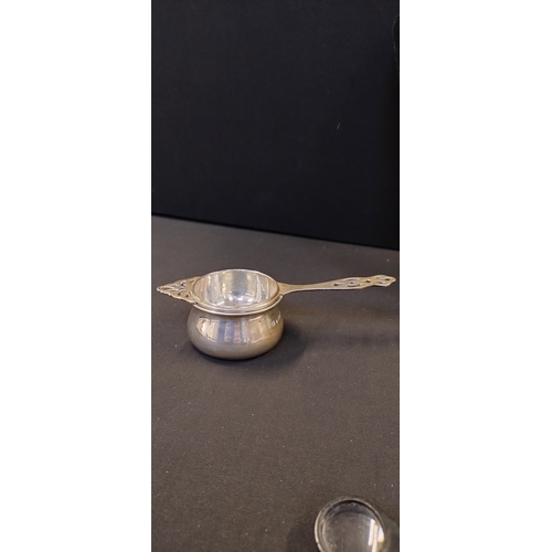 15 - Sterling silver 1934  tea strainer. Birmingham. Date letter K. Weight approx 78.86g