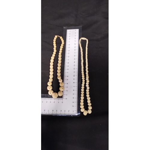 148 - Two bone necklaces. Measures approx L 9 inches and 8 inches