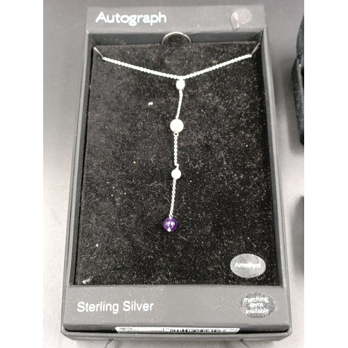 151 - Selection of Sterling silver jewellery including an amethyst necklace, earrings and charms