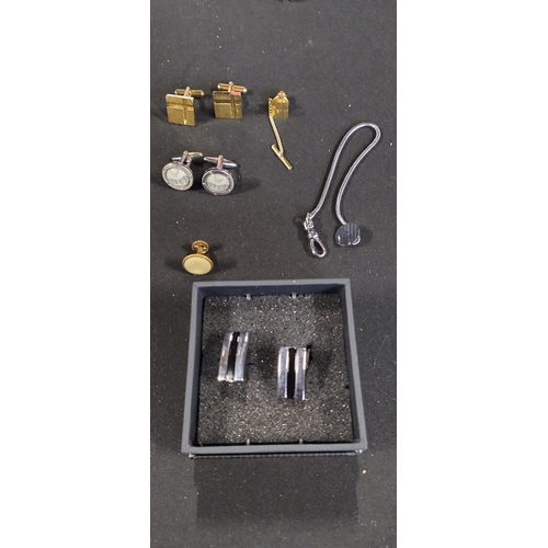 157 - Collection of cufflinks and watch fob chain tie pins