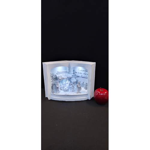 164 - Battery operated White and white silver glitter resin nativity scene. Tested for power