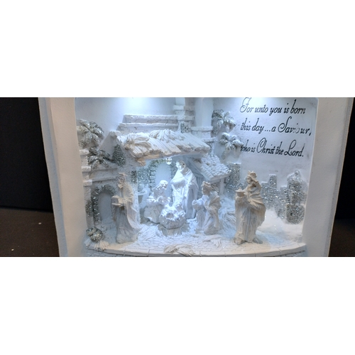 164 - Battery operated White and white silver glitter resin nativity scene. Tested for power