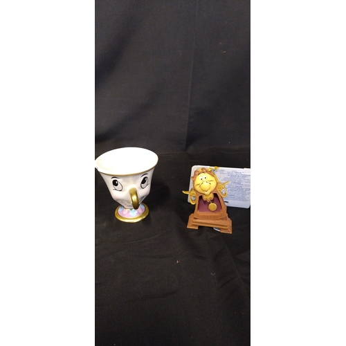 187 - Beauty and the Beast items including Chip cup, Belle, Lumiere and Cogsworth Christmas decorations