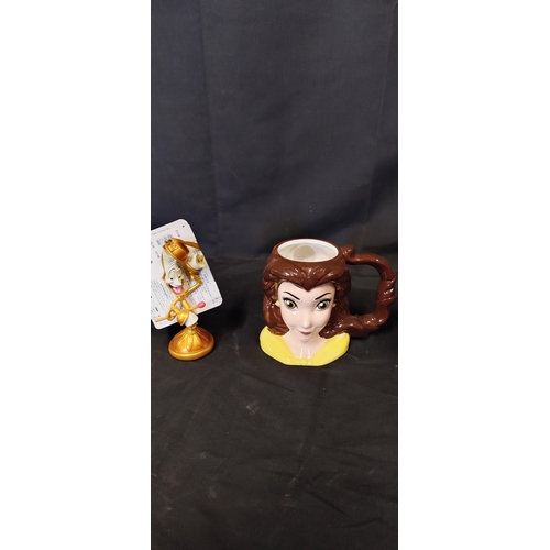 187 - Beauty and the Beast items including Chip cup, Belle, Lumiere and Cogsworth Christmas decorations