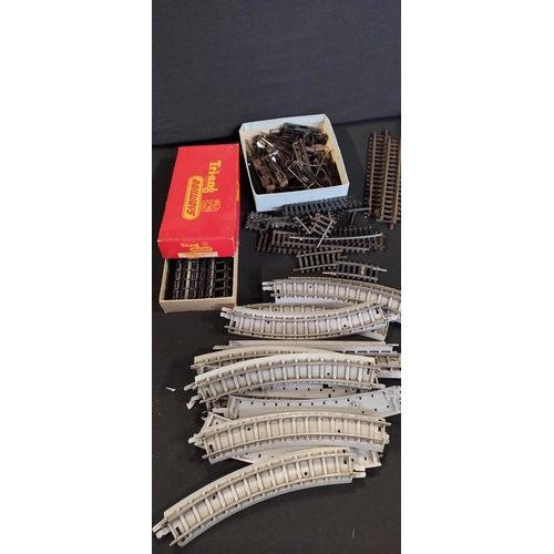 188 - Vintage train tracks including a Tri-ang straight track and other items