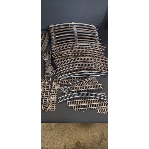 188 - Vintage train tracks including a Tri-ang straight track and other items