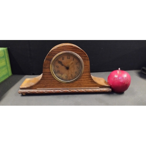 203 - Wind up mantle clock retailed by Bravingtons Ltd of London. Measures approx 16 x 29.5 x 7.5 cm