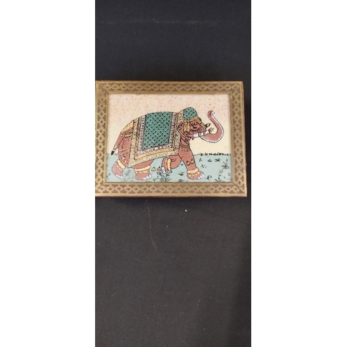 209 - Two elephant ornaments and a  trinket box with brass details and crushed semi-precious stones in the... 