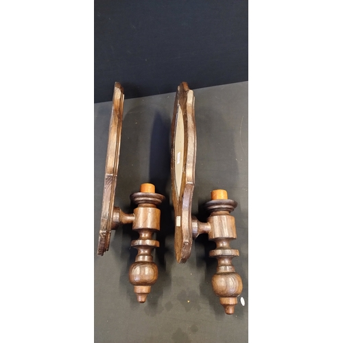 210 - Two vintage mirrored wooden wall sconces with candle holders. Measures approx 51 x 16 cm