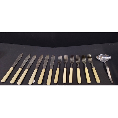 211 - 4 Wood Handle brass cheese forks and cutlery and a vintage tangram puzzle