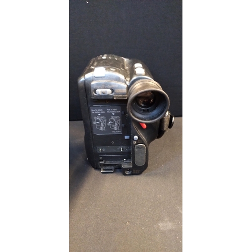 221 - Panasonic VHS-C Movie camera. NV S100. Battery charger, battery, lens and camera bag