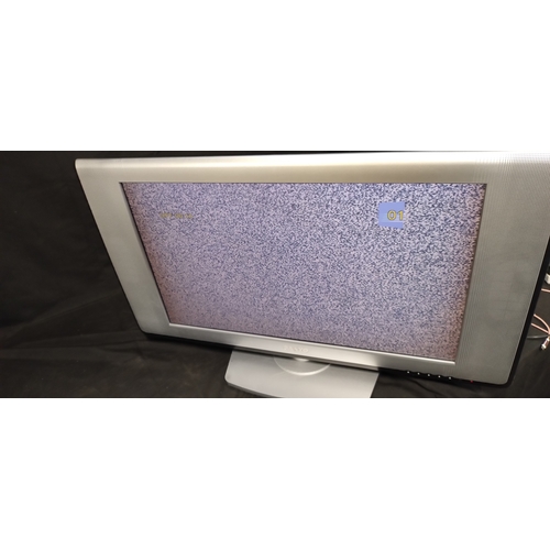 243 - Sanyo 27 inch TV on swivel base with remote control and instruction booklet. Tested for power