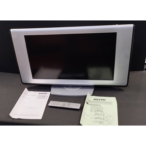 243 - Sanyo 27 inch TV on swivel base with remote control and instruction booklet. Tested for power