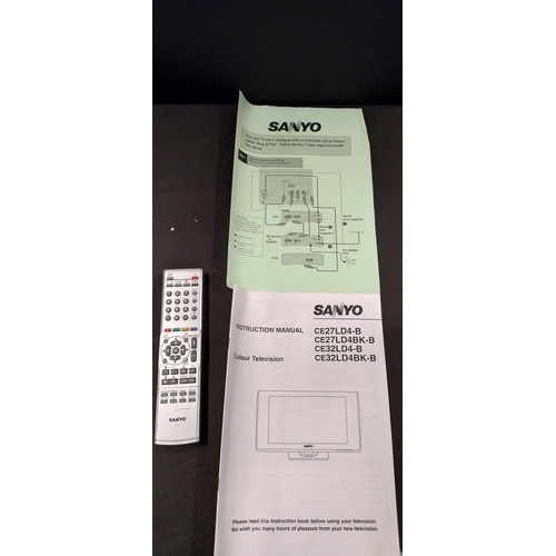 243 - Sanyo 27 inch TV on swivel base with remote control and instruction booklet. Tested for power