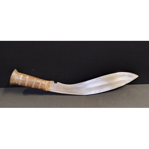 245 - Napolese Kukri knife and leather sheath with marking etched within and a British Sword pattern bayon... 