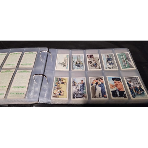 255 - Two file books containing Hundreds of various vintage cigarette cards