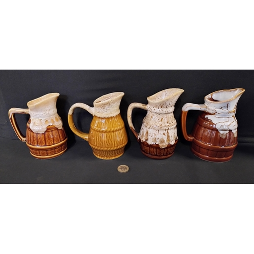 267 - 4 various size pitcher jugs