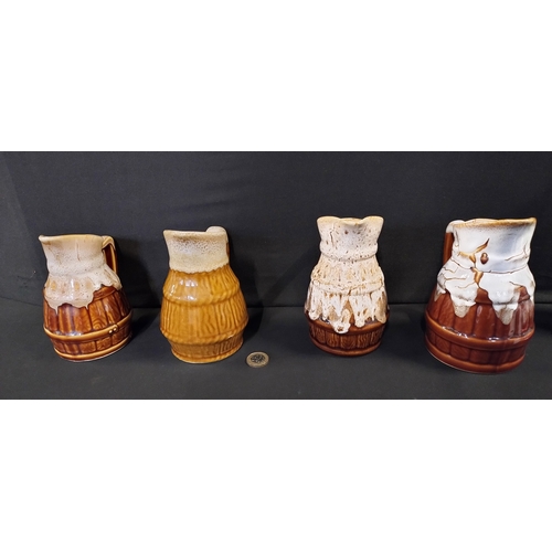 267 - 4 various size pitcher jugs