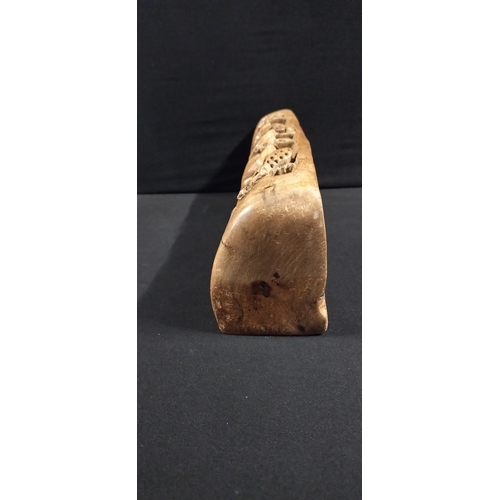 275 - heavy wooden hand carving of deer. Measures approx H 11 x W 34.5 x D 7 cm