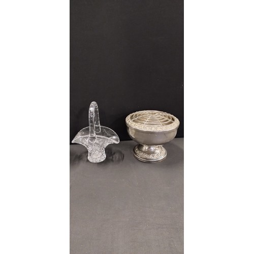 284 - Collection of pin wheel crystal vases, barrel vases, silver plated flower posy vase and other items