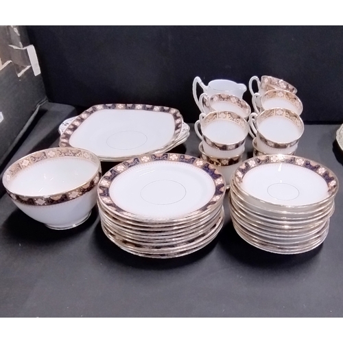 295 - Vintage Shore & Coggins Bell China tea set and a mixed lot of various plates