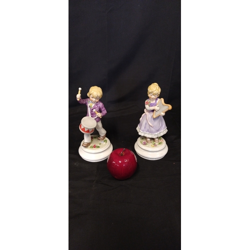 306 - Two Goebel figurines boy with drum limited edition No 824/2000 and girl with a harp limited edition ... 