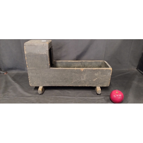 408 - Vintage wooden rocking crib measures approx 52 x 22 cm