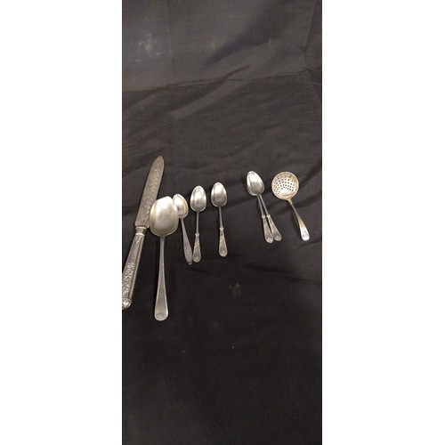 24 - silver plated teaspoons. And 1 Sheffield sterling silver date F 1923