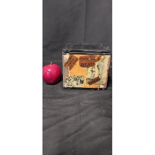 40 - Wooden box with various decorations around. And a spring loaded figure of a man made of plaster/ cla... 