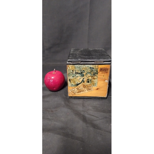 40 - Wooden box with various decorations around. And a spring loaded figure of a man made of plaster/ cla... 