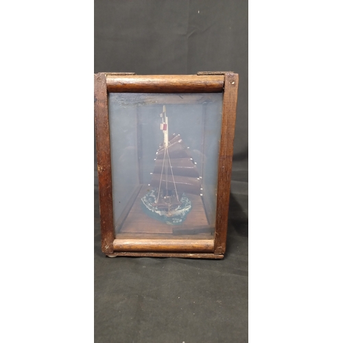 44 - Miniature ship in a display box. Measures approx H 19 x 22 x D 14 cm