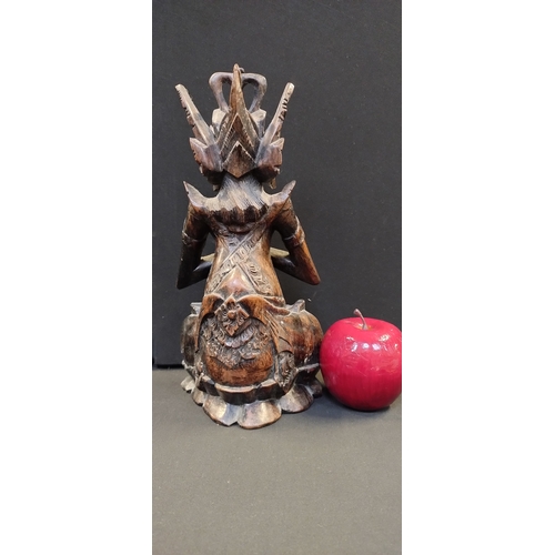 55 - Bahli Wooden carved deity figurine. Measures approx H 27 x W 13 x D 9.5 cm