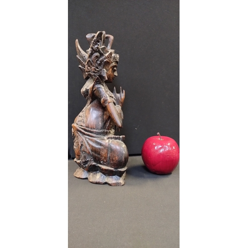 55 - Bahli Wooden carved deity figurine. Measures approx H 27 x W 13 x D 9.5 cm