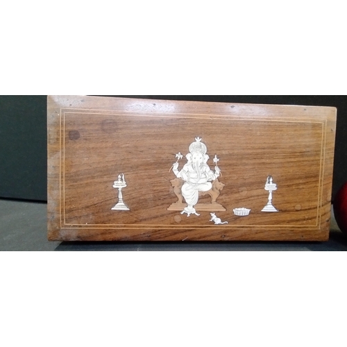 64 - Indian bone inlaid wood box with the image of Ganesha. Measures approx H 6.5 x W 25.5 x D 12. 5 cm