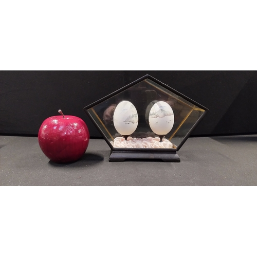 72 - Two oriental dioramas and set of 2 Chinese painted eggs in display case