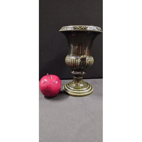 80 - Dartmouth Pottery urn vase with a dark green glaze. Measures approx H 23 x W 15