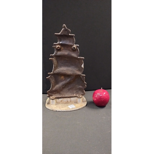 97 - Cast metal sail ship door stop. Measures approx H 33 x W 19 x D 13