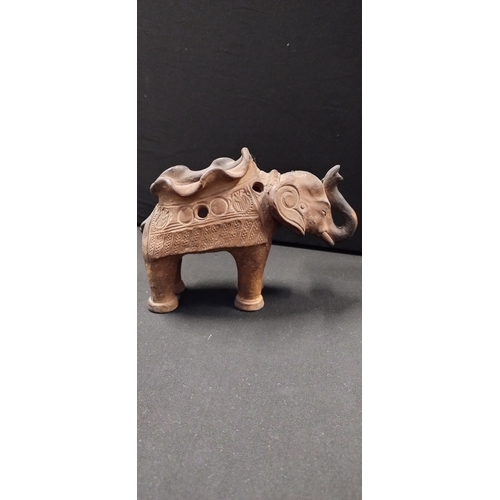 112 - Four various elephants made of different materials