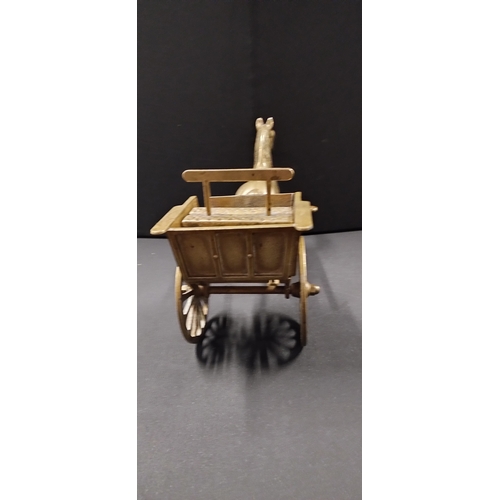 115 - Solid brass horse and cart. Measures approx H 21.5 x W 38 x D 14 cm