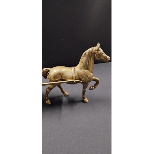 115 - Solid brass horse and cart. Measures approx H 21.5 x W 38 x D 14 cm