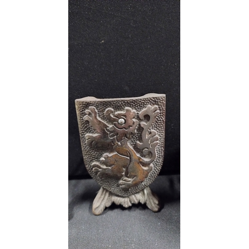 122 - Vintage knight bottle opener and shield stand