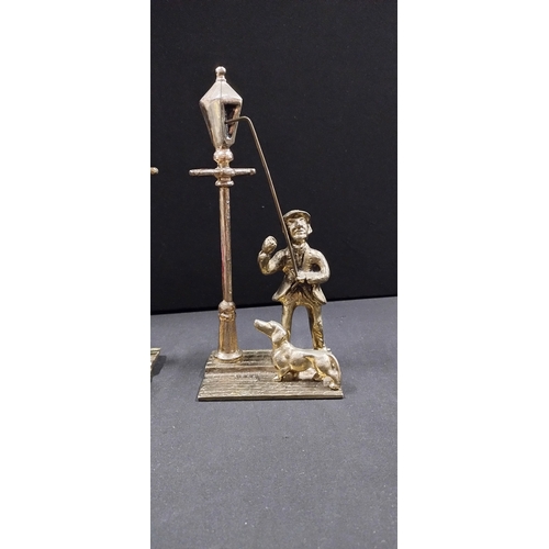 123 - Brass Gas Lamplighter Figure, and a police officer with a dog under street light