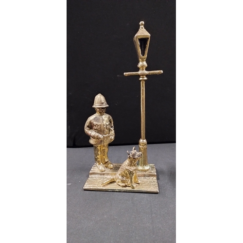 123 - Brass Gas Lamplighter Figure, and a police officer with a dog under street light